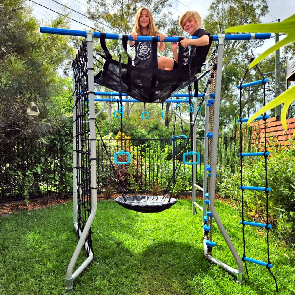 Kids climbing on an outdoor jungle gym in America